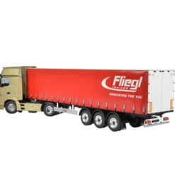 Carson 500907235 3-Achs Fliegl Megarunner Plane (Rot) 1:14